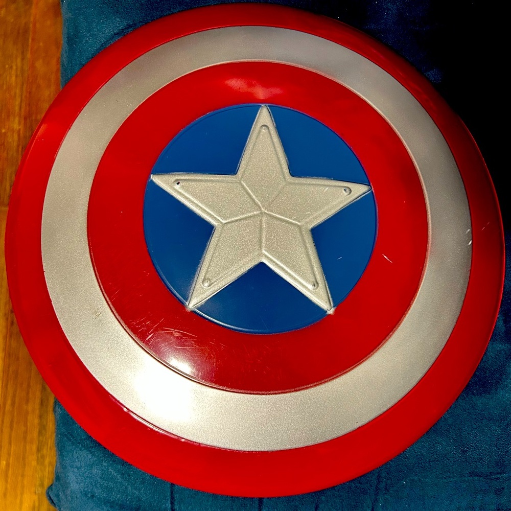Gently used kids Captain America shield .